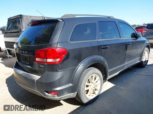 2013 Dodge Journey SXT z VIN 3C4PDCBB5DT585847, wystawiony jako IAAI lot #43145564 z przebiegiem 191 954 mil mil oraz . Historia ofert i sprzedaży dostępna na DreamBid. Obrazek 4.