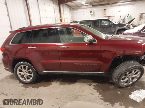 2020 Jeep Grand Cherokee Summit with VIN 1C4RJFJG3LC251228, listed as a IAAI auction lot 41278249 with 110,745 mi miles and . Bid and sale history available at DreamBid. Image 13.