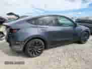 2021 Tesla Model Y Long Range with VIN 5YJYGDEEXMF282598, listed as a Copart auction lot 71928785 with 101,186 mi miles and Salvage title. Bid and sale history available at DreamBid. Image 3.