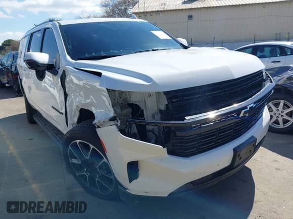 2023 Chevrolet Suburban RST с VIN 1GNSKEKLXPR236014, выставлен на аукционе IAAI как лот 41736355 с пробегом 62 279 миль миль и . История ставок и продаж доступна на DreamBid. Изображение 1.