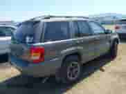1999 Jeep Grand Cherokee Laredo с VIN 1J4G258S7XC656551, выставлен на аукционе IAAI как лот 42182464 с пробегом 230 709 миль миль и . История ставок и продаж доступна на DreamBid. Изображение 4.