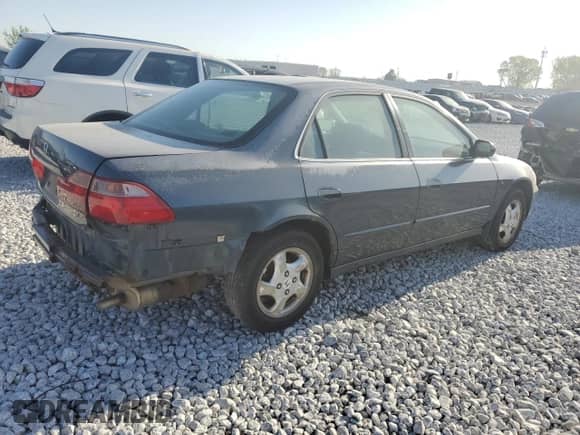 1998 Honda Accord EX with VIN 1HGCG565XWA065628, listed as a Copart auction lot 87243474 with 274,618 mi miles and Salvage title. Bid and sale history available at DreamBid. Image 3.