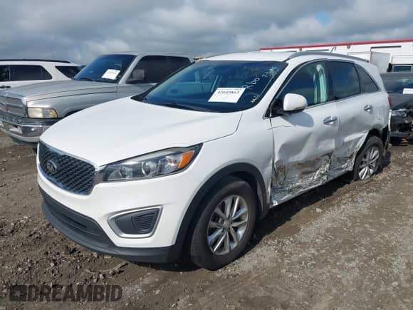 2018 Kia Sorento LX with VIN 5XYPG4A52JG393491, listed as a IAAI auction lot 42649863 with 151,745 mi miles and . Bid and sale history available at DreamBid. Image 2.