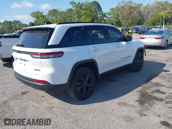 2023 Jeep Grand Cherokee Limited with VIN 1C4RJGBG5PC509713, listed as a IAAI auction lot 41303836 with 20,556 mi miles and . Bid and sale history available at DreamBid. Image 4.