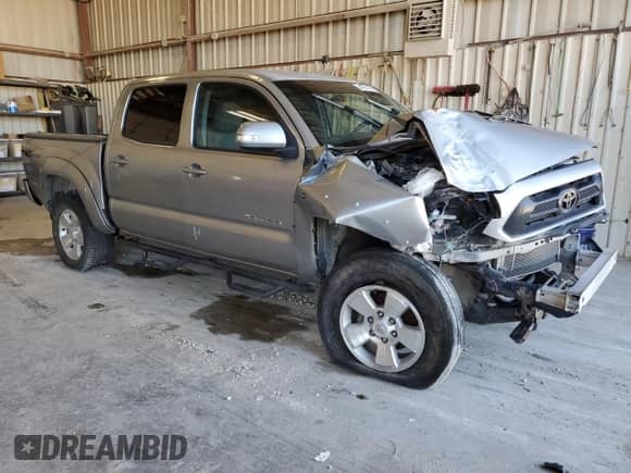 2014 Toyota Tacoma PreRunner with VIN 3TMJU4GN4EM173574, listed as a Copart auction lot 90231655 with 119,170 mi miles and Clean title. Bid and sale history available at DreamBid. Image 4.