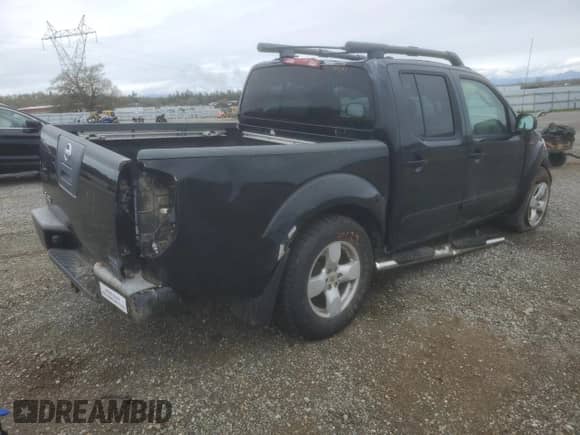 2007 Nissan Frontier LE with VIN 1N6AD07W17C401906, listed as a Copart auction lot 49831275 with 137,696 mi miles and Salvage title. Bid and sale history available at DreamBid. Image 3.