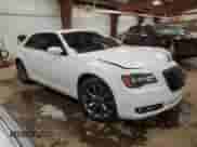 2014 Chrysler 300 S with VIN 2C3CCAGT9EH276677, listed as a Copart auction lot 82323494 with 153,286 mi miles and Clean title. Bid and sale history available at DreamBid. Image 4.
