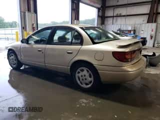 2002 Saturn SL с VIN 1G8ZK54742Z111536, выставлен на аукционе Copart как лот 62116464 с пробегом 151 737 миль миль и Списание • Salvage title. История ставок и продаж доступна на DreamBid. Изображение 2.