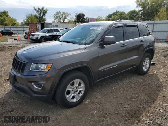 2014 Jeep Grand Cherokee Laredo z VIN 1C4RJFAG5EC134169, wystawiony jako Copart lot #82384405 z przebiegiem 168 296 mil mil oraz Szkoda całkowita • Salvage title. Historia ofert i sprzedaży dostępna na DreamBid. Obrazek 1.