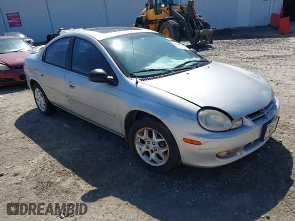 2002 Dodge Neon ES z VIN 1B3ES56C62D621562, wystawiony jako IAAI lot #41960655 z przebiegiem 237 598 mil mil oraz . Historia ofert i sprzedaży dostępna na DreamBid. Obrazek 1.