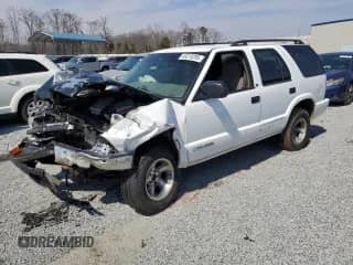 2003 Chevrolet Blazer LS с VIN 1GNCS13X43K162199, выставлен на аукционе Copart как лот 49215295 с пробегом Не указан миль и Списание • Salvage title. История ставок и продаж доступна на DreamBid. Изображение 1.