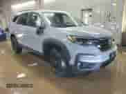 2022 Honda Pilot TrailSport with VIN 5FNYF6H81NB092582, listed as a Copart auction lot 48993975 with 125,514 mi miles and Salvage title. Bid and sale history available at DreamBid. Image 4.