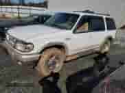 2000 Ford Explorer Eddie Bauer z VIN 1FMDU64EXYZA33959, wystawiony jako Copart lot #80703974 z przebiegiem 181 523 mil mil oraz Szkoda całkowita • Salvage title. Historia ofert i sprzedaży dostępna na DreamBid. Obrazek 1.