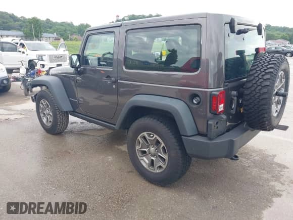2014 Jeep Wrangler Rubicon with VIN 1C4BJWCG3EL221499, listed as a IAAI auction lot 42541878 with 43,757 mi miles and . Bid and sale history available at DreamBid. Image 3.