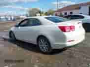 2013 Chevrolet Malibu LT z VIN 1G11E5SAXDF178485, wystawiony jako IAAI lot #43399346 z przebiegiem 143 805 mil mil oraz . Historia ofert i sprzedaży dostępna na DreamBid. Obrazek 3.