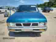 1995 Nissan Frontier with VIN 1N6SD11S3SC358078, listed as a Copart auction lot 71859815 with 118,833 mi miles and Salvage title. Bid and sale history available at DreamBid. Image 5.