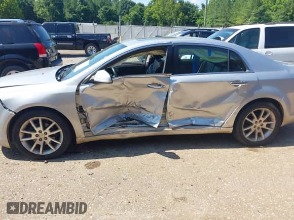 2012 Chevrolet Malibu LTZ z VIN 1G1ZG5E7XCF271129, wystawiony jako IAAI lot #42713063 z przebiegiem 127 511 mil mil oraz . Historia ofert i sprzedaży dostępna na DreamBid. Obrazek 6.