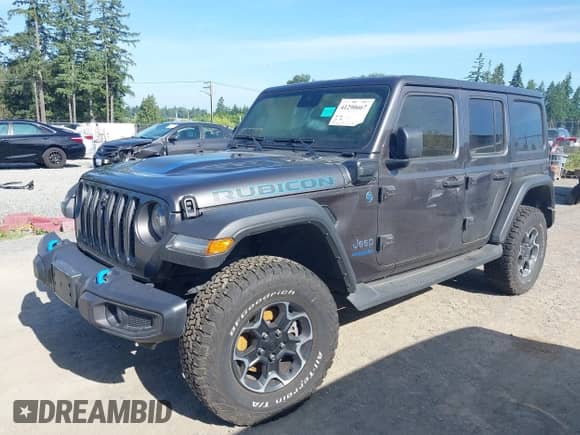 2022 Jeep Wrangler Unlimited Rubicon with VIN 1C4JJXR66NW223262, listed as a IAAI auction lot 41290667 with Not provided miles and . Bid and sale history available at DreamBid. Image 2.