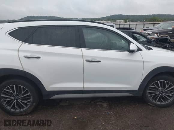 2021 Hyundai Tucson SEL z VIN KM8J33AL6MU402928, wystawiony jako IAAI lot #43105643 z przebiegiem 52 078 mil mil oraz . Historia ofert i sprzedaży dostępna na DreamBid. Obrazek 14.