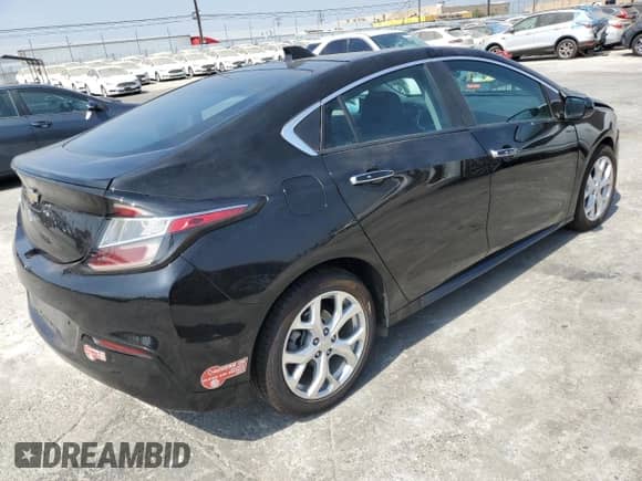 2018 Chevrolet Volt Premier с VIN 1G1RD6S56JU127152, выставлен на аукционе Copart как лот 70391075 с пробегом 53 798 миль миль и Списание • Salvage title. История ставок и продаж доступна на DreamBid. Изображение 3.