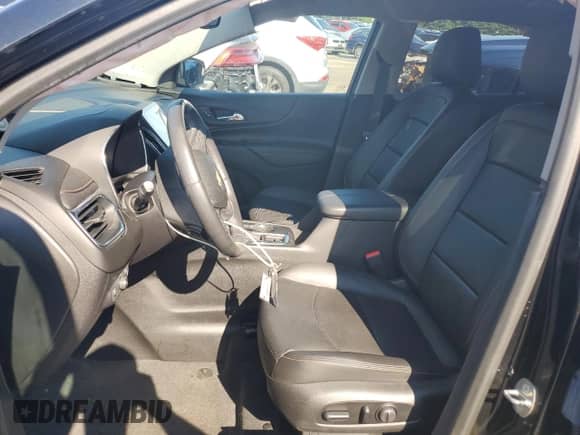 2018 Chevrolet Equinox Premier с VIN 2GNAXWEX6J6321436, выставлен на аукционе Copart как лот 63066895 с пробегом 65 101 миль миль и Списание • Salvage title. История ставок и продаж доступна на DreamBid. Изображение 7.