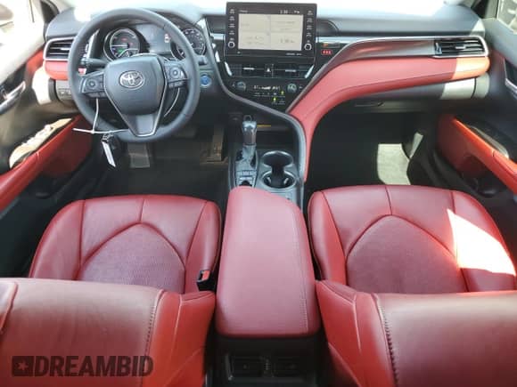 2021 Toyota Camry Hybrid XSE with VIN 4T1K31AK4MU028027, listed as a Copart auction lot 69702145 with 84,116 mi miles and Salvage title. Bid and sale history available at DreamBid. Image 8.