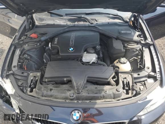 2015 BMW 4 Series 428i xDrive z VIN WBA4C9C58FD330455, wystawiony jako Copart lot #60933335 z przebiegiem 146 776 mil mil oraz Szkoda całkowita • Salvage title. Historia ofert i sprzedaży dostępna na DreamBid. Obrazek 11.