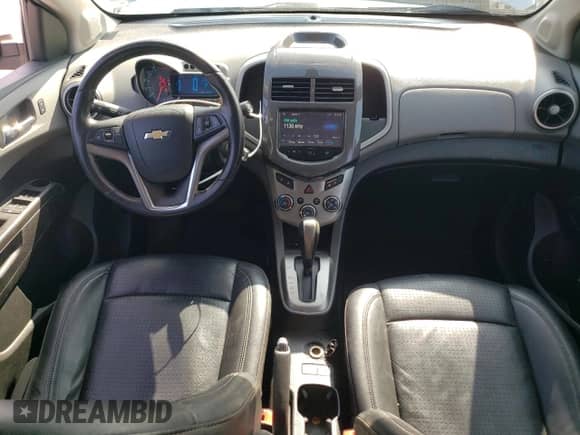 2014 Chevrolet Sonic LTZ with VIN 1G1JE5SB6E4215697, listed as a Copart auction lot 70820024 with 166,414 mi miles and Salvage title. Bid and sale history available at DreamBid. Image 8.