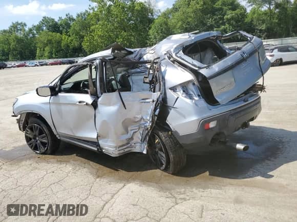2021 Honda Passport Sport with VIN 5FNYF8H23MB001253, listed as a Copart auction lot 65848855 with 107,648 mi miles and Salvage title. Bid and sale history available at DreamBid. Image 2.