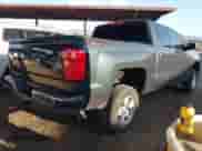 2018 Chevrolet Silverado 1500 LT with VIN 3GCUKREC2JG234849, listed as a IAAI auction lot 42432401 with 52,087 mi miles and . Bid and sale history available at DreamBid. Image 4.