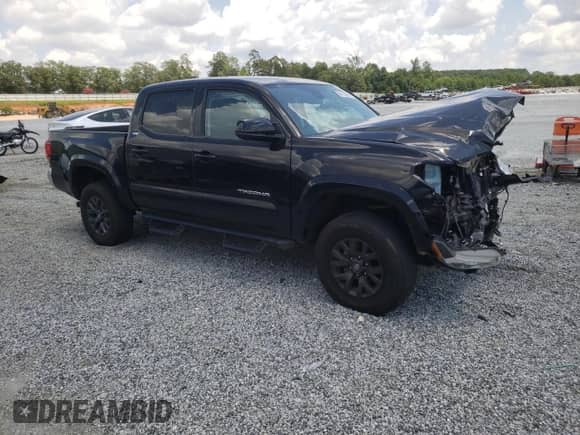 2023 Toyota Tacoma SR5 z VIN 3TMAZ5CN9PM213146, wystawiony jako Copart lot #64479895 z przebiegiem 28 057 mil mil oraz Szkoda całkowita • Salvage title. Historia ofert i sprzedaży dostępna na DreamBid. Obrazek 4.