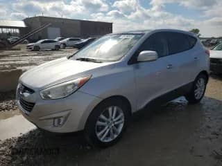 2011 Hyundai Tucson Limited с VIN KM8JUCAC1BU170071, выставлен на аукционе Copart как лот 90676545 с пробегом 170 759 миль миль и Чистый • Clean title. История ставок и продаж доступна на DreamBid. Изображение 1.
