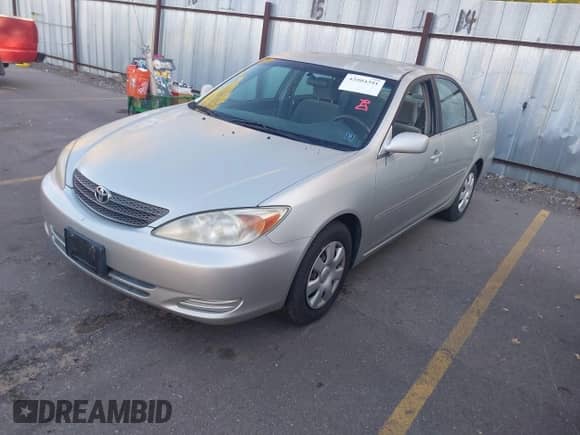 2003 Toyota Camry LE with VIN JTDBE32K130187036, listed as a IAAI auction lot 43504391 with 205,170 mi miles and . Bid and sale history available at DreamBid. Image 2.