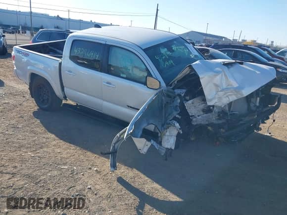 2022 Toyota Tacoma TRD Off Road with VIN 3TYCZ5AN5NT091043, listed as a IAAI auction lot 43286414 with 30,864 mi miles and . Bid and sale history available at DreamBid. Image 1.