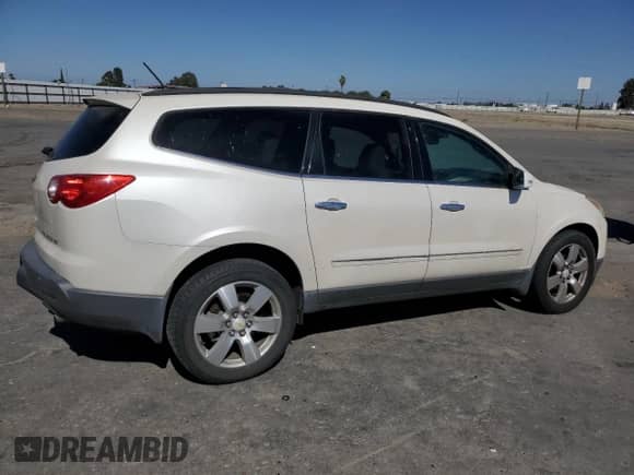 2011 Chevrolet Traverse LTZ с VIN 1GNKVLED5BJ337372, выставлен на аукционе Copart как лот 69650955 с пробегом 90 896 миль миль и Списание • Salvage title. История ставок и продаж доступна на DreamBid. Изображение 3.