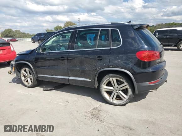 2014 Volkswagen Tiguan S с VIN WVGBV3AX2EW031578, выставлен на аукционе Copart как лот 83960015 с пробегом 101 454 миль миль и Списание • Salvage title. История ставок и продаж доступна на DreamBid. Изображение 2.