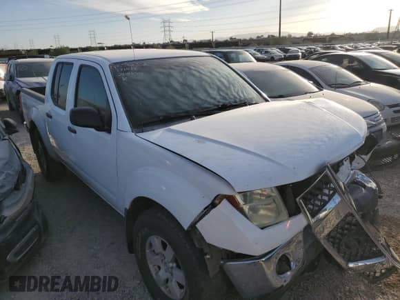 2005 Nissan Frontier Nismo с VIN 1N6AD07W15C410456, выставлен на аукционе Copart как лот 78011124 с пробегом 132 845 миль миль и Списание • Salvage title. История ставок и продаж доступна на DreamBid. Изображение 4.