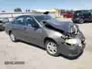 2006 Toyota Camry LE with VIN 4T1BF30K46U631809, listed as a Copart auction lot 67420125 with 121,995 mi miles and Salvage title. Bid and sale history available at DreamBid. Image 4.