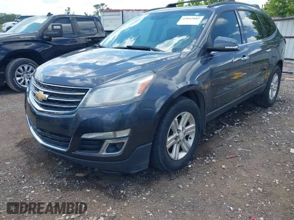 2013 Chevrolet Traverse LT with VIN 1GNKVJKD7DJ209355, listed as a IAAI auction lot 42842885 with 178,604 mi miles and . Bid and sale history available at DreamBid. Image 2.