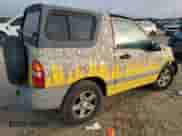 2003 Chevrolet Tracker with VIN 2CNBE18C136928311, listed as a Copart auction lot 84463154 with 118,195 mi miles and Salvage title. Bid and sale history available at DreamBid. Image 3.