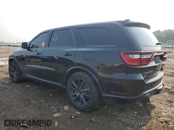 2018 Dodge Durango SRT with VIN 1C4SDJGJ6JC216968, listed as a Copart auction lot 67390205 with 86,641 mi miles and Salvage title. Bid and sale history available at DreamBid. Image 2.