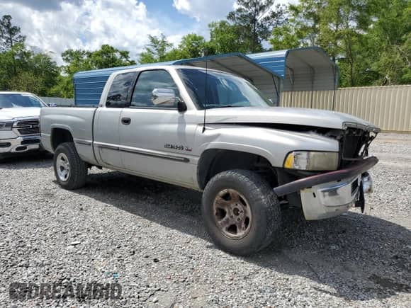 1998 Dodge 1500 with VIN 3B7HF13ZXWG152325, listed as a Copart auction lot 52207135 with 311,508 mi miles and Salvage title. Bid and sale history available at DreamBid. Image 4.