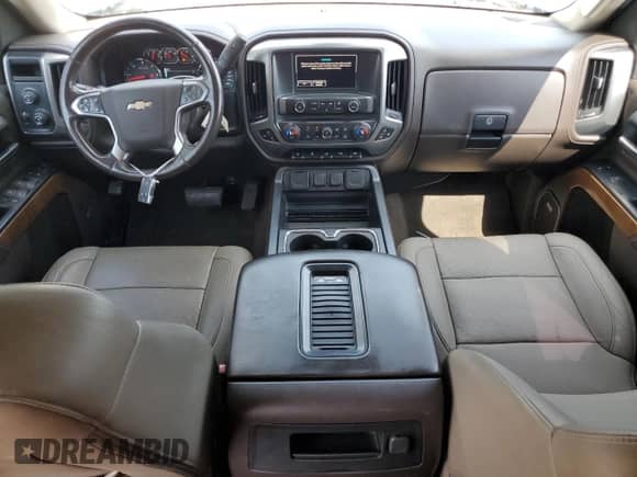 2018 Chevrolet Silverado 1500 LTZ z VIN 3GCUKSEJ2JG195475, wystawiony jako Copart lot #61949685 z przebiegiem Nie podano mil oraz Czysty tytuł • Clean title. Historia ofert i sprzedaży dostępna na DreamBid. Obrazek 8.