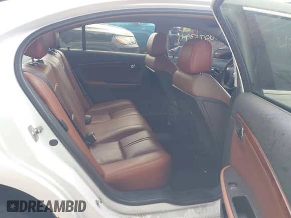2009 Saturn Aura XR with VIN 1G8ZX57759F193852, listed as a IAAI auction lot 42753941 with 152,006 mi miles and . Bid and sale history available at DreamBid. Image 8.