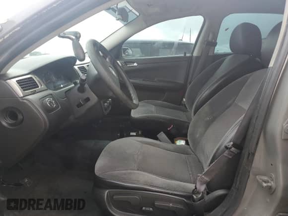 2012 Chevrolet Impala Police Police with VIN 2G1WD5E3XC1162170, listed as a Copart auction lot 70986324 with 148,208 mi miles and Salvage title. Bid and sale history available at DreamBid. Image 7.