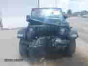 2021 Jeep Wrangler Unlimited Willys with VIN 1C4HJXDN7MW504854, listed as a IAAI auction lot 42605357 with 74,092 mi miles and . Bid and sale history available at DreamBid. Image 12.