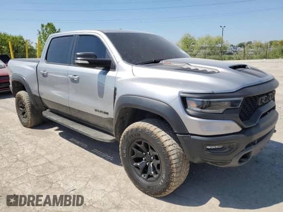 2022 Ram 1500 with VIN MVIN389436IND, listed as a Copart auction lot 55157015 with 47,039 mi miles and Salvage title. Bid and sale history available at DreamBid. Image 4.
