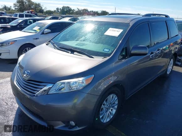2016 Toyota Sienna XLE with VIN 5TDYK3DC7GS721667, listed as a IAAI auction lot 41400702 with 85,188 mi miles and . Bid and sale history available at DreamBid. Image 2.