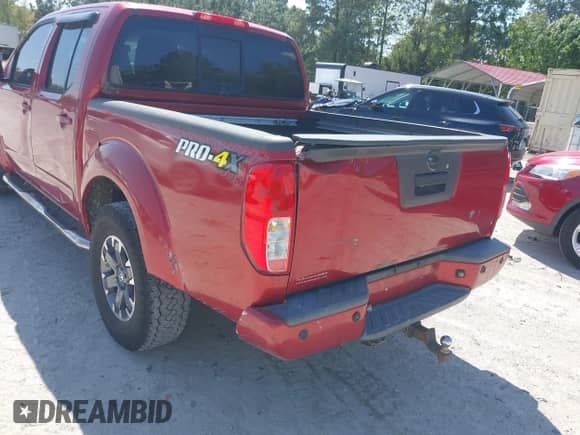 2014 Nissan Frontier S with VIN 1N6AD0EV3EN734085, listed as a IAAI auction lot 42007200 with Not provided miles and . Bid and sale history available at DreamBid. Image 16.