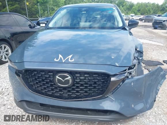 2025 Mazda CX-5 S Carbon Edition z VIN JM3KFBCM8S0646821, wystawiony jako IAAI lot #42610837 z przebiegiem Nie podano mil oraz . Historia ofert i sprzedaży dostępna na DreamBid. Obrazek 12.